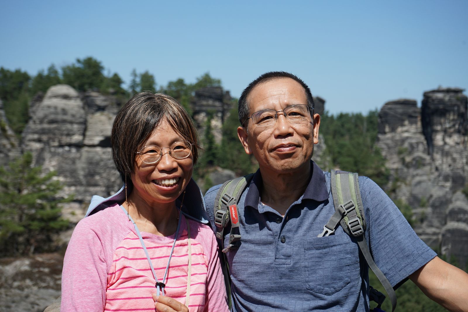 Retired couple exploring a scenic landscape